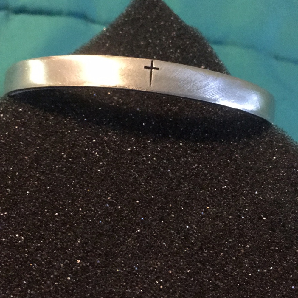 Silver cuff with cross